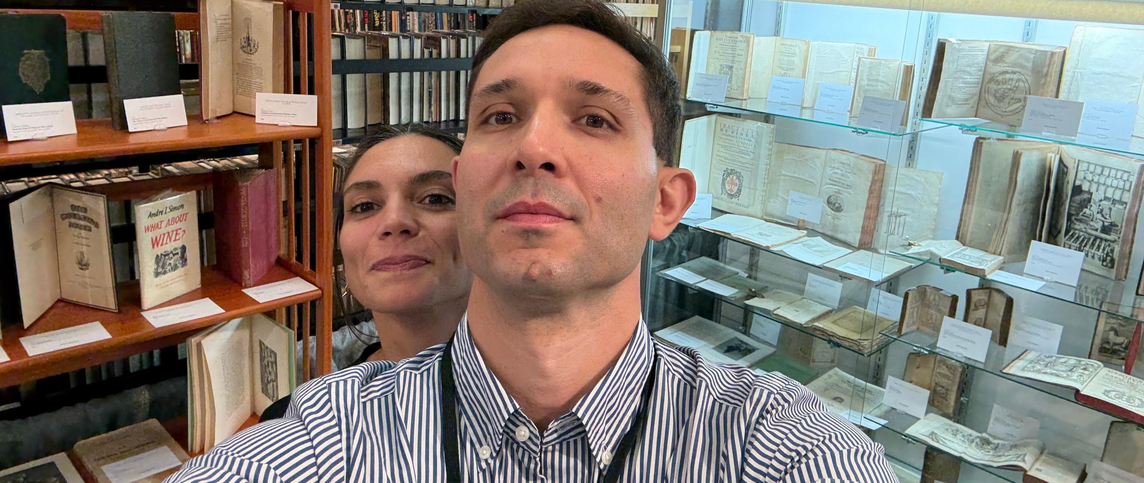 La Fenice Antiquaria taking a selfie in front of their booth at SABF